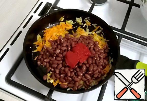Add tomato paste, a little water.