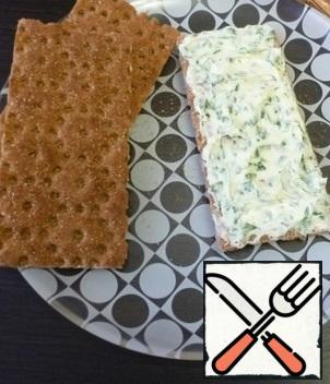 Spread buckwheat bread with green butter.