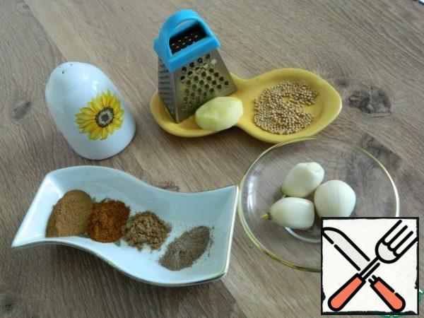 We will prepare the necessary products. Prepare spices, garlic, ginger, vinegar, oil, salt.