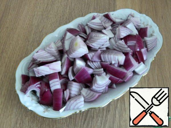 Put the red onion in the pot first.