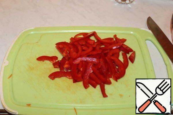Pepper cut into thin strips.