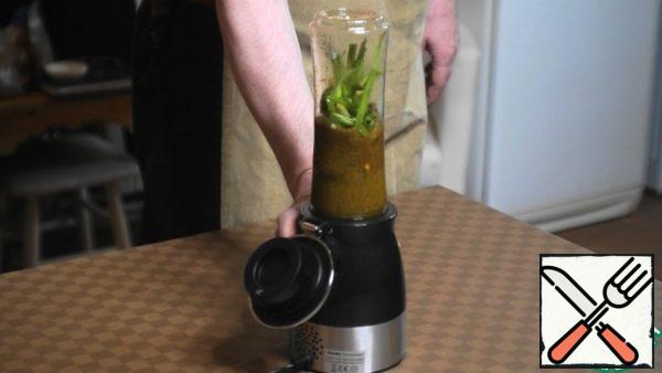 All the ingredients, except the chicken, are loaded into a blender, and grind until smooth.