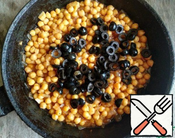 Then add the chopped olives and simmer for another 3-5 minutes.