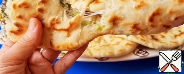 Hot tortillas immediately grease with butter and put them on top of each other. Delicious tortillas with cottage cheese to serve hot. The cooled tortillas are no less delicious! Bon Appetit!