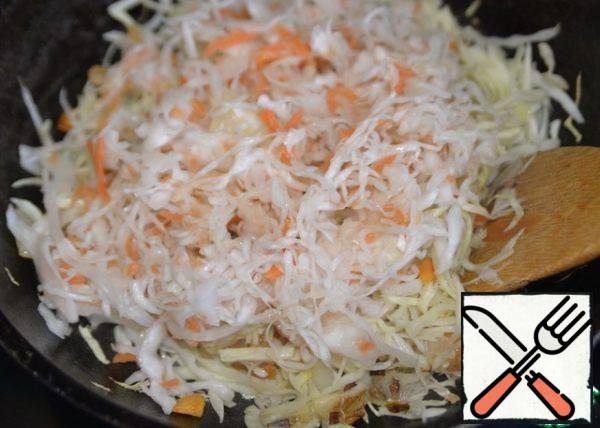 Add the sauerkraut, stir, and simmer over medium heat for 10 minutes.