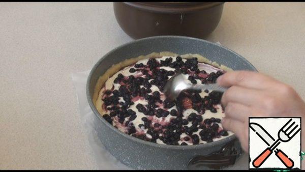 Bake the cheesecake in a preheated 180 degree oven for 55 minutes.