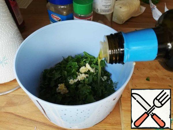Finely chop the herbs and garlic, mix with salt, pepper, lemon juice. Add a little oil and stir