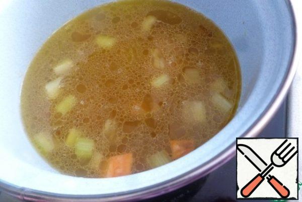Pour water or vegetable broth into a saucepan. Bring to a boil and cook until the sweet potatoes are soft.