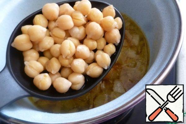 Add the boiled chickpeas to the pan and bring to a boil.