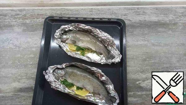 We lay the trout on the foil