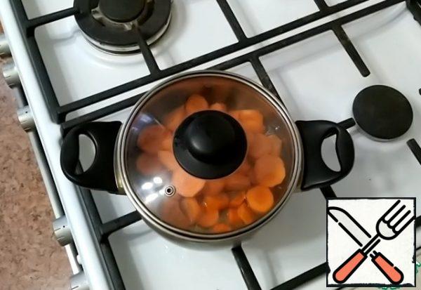 Carrots need to be cleaned, washed and cut into small pieces in a small saucepan. Simmer the carrots in a small amount of water until tender for about 15 minutes.