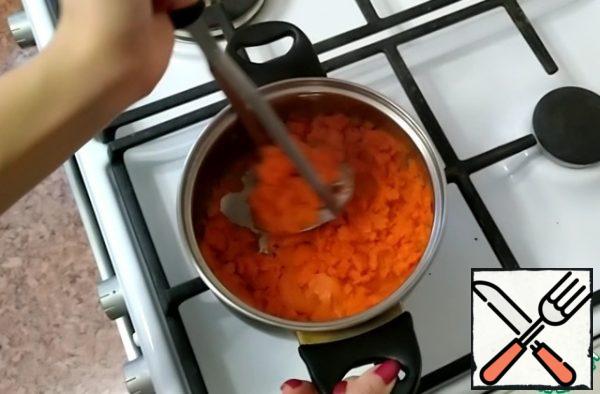 Then, drain the water and puree the carrots.