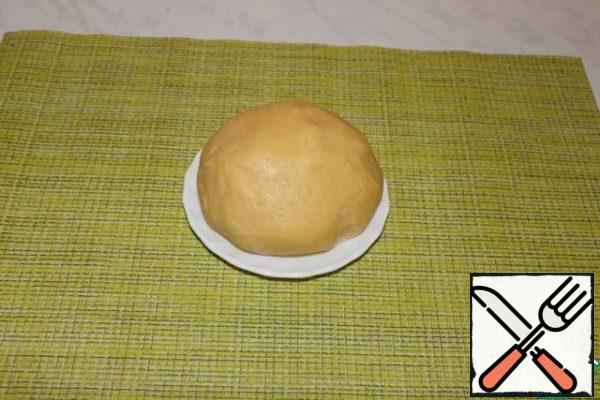 Knead the soft dough. The dough does not stick to your hands. Transfer the dough to a bag and put it in the refrigerator for 30-60 minutes.