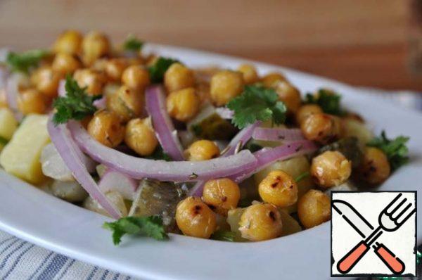 Spread hot toasted chickpeas on top, garnish with coriander greens.
Serve immediately.