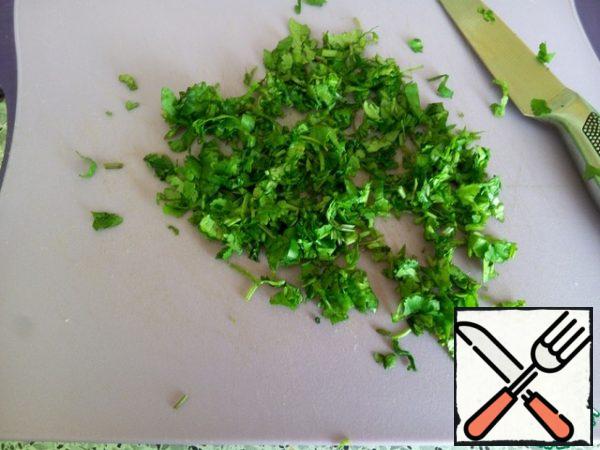Finely chop the coriander.