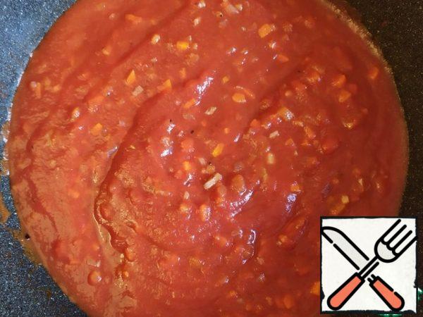 Add the tomato sauce.