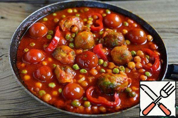 Pour the tomato paste over the chickpeas, put the cabbage, bring to a low boil and simmer for 15 minutes, if the water is too boiled, and the gravy is too thick,then you can add water. Then add the cherry tomatoes and peas. Simmer for another 5 minutes.