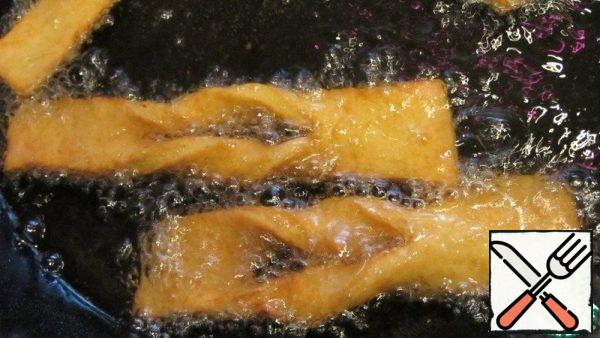 Fry until golden brown on both sides.