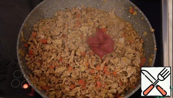 Put the tomato paste and simmer a little