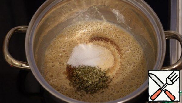 Add all the spices: Chili, oregano, cumin, salt
