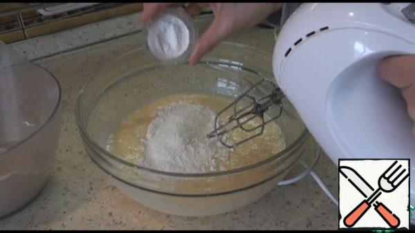 Add flour in two sets and baking powder, stir well.