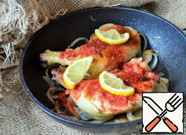 Add paprika, pepper, lemon slices and sugar, and cook over low heat for 5 minutes.