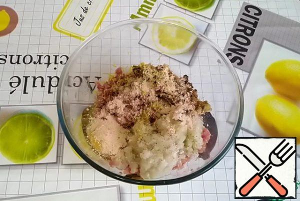 Add the egg, a little lemon zest, salt to taste, ground black pepper, breadcrumbs.