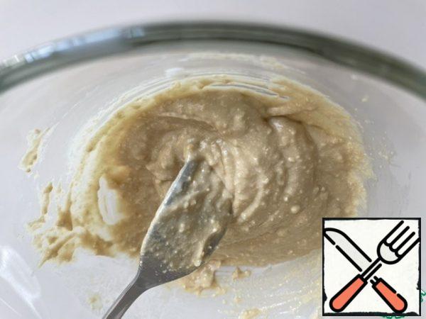 Add the milk and knead until the consistency of "cream paste".