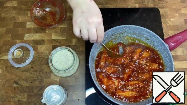 Mix tomato paste, honey, spices (to taste) and add to the meat. Boil it. The sauce should thicken.