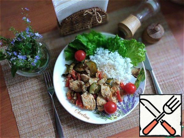 The breast was not dry. Flavorful, healthy and delicious!

According to my diet, I was offered for lunch:
Chicken breast (turkey) stewed with vegetables-200 g
Boiled rice-50 g
tomato-0.5 pcs
cucumber-0.5 pcs
I took 3 pieces of cherry instead of half a tomato, and instead of half a cucumber-3 small lettuce leaves.
