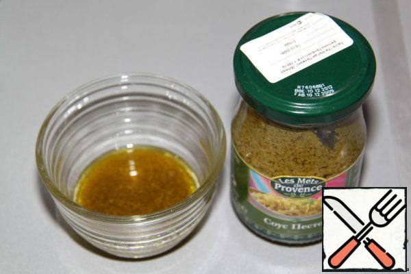 Prepare the sauce: 50 g. olive oil and 30 g. Pesto sauce.