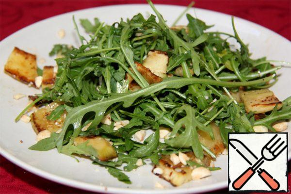 Choose 6 large layers of zucchini and set aside. The remaining layers are cut into cubes and added to the salad.