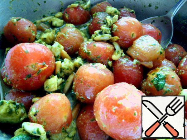 Mix tomatoes, mozzarella, nuts with basil. Let it stand for an hour or two.