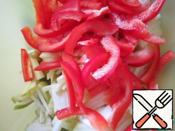 Cut the bell pepper into strips. Add to the rest of the ingredients.