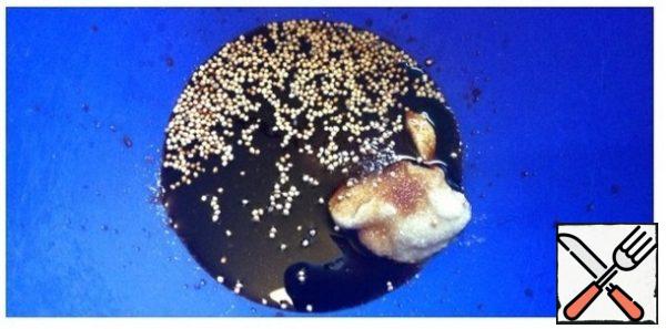In a bowl for marinating, pour soy sauce. Add both types of mustard and sugar.