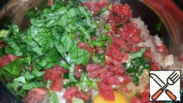 Finely chop the tomato and basil.