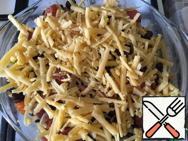 Pour the beans and vegetables into a suitable baking dish. Sprinkle with grated hard cheese. Place in a hot oven (180-190°C) until the cheese melts. For about 10 minutes.