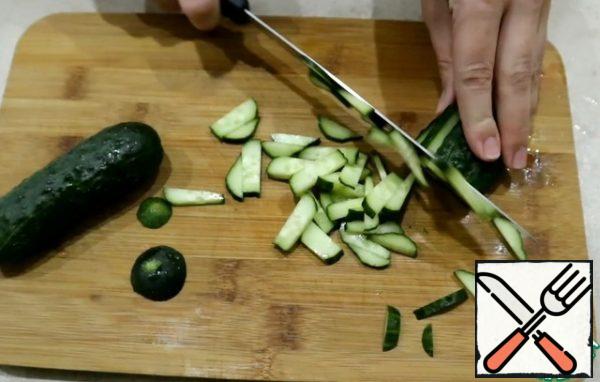 Cucumbers cut into small pieces, I cut into strips.