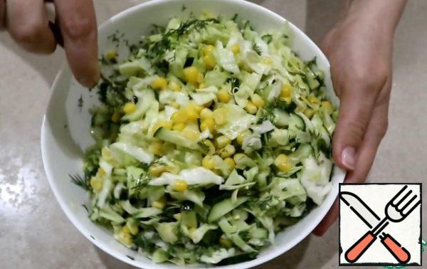 Salad with corn, cucumber and cabbage is ready! Bon appetit, everyone!