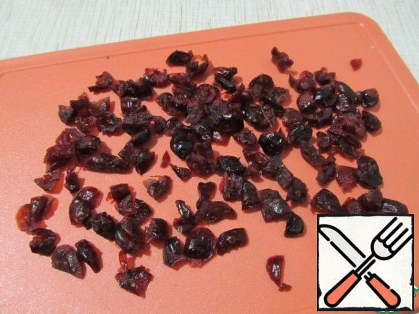 Large cranberry berries are also cut.