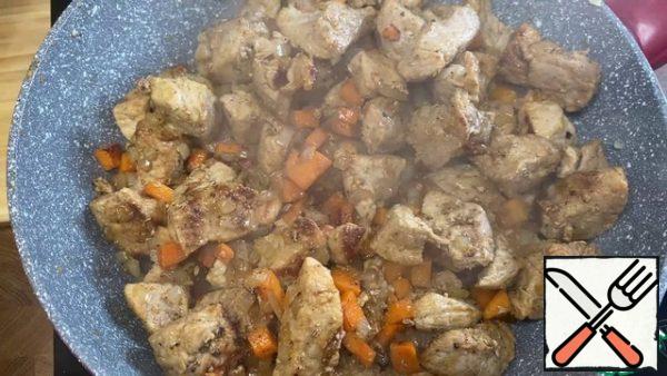 Add the carrots and onions. Simmer until the vegetables are ready.