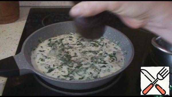 Add salt and pepper to taste and simmer for a couple of minutes.