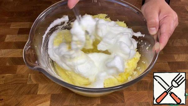 Whisk the whites into a fluffy foam and add to the dough.