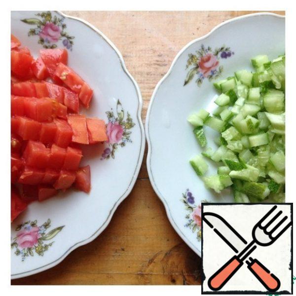 Cut the cucumber and tomato into a small cube.