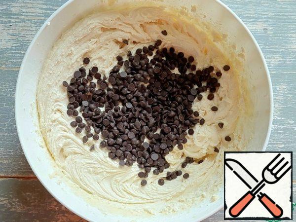 Then add chocolate drops or just finely chopped chocolate. Mix with a spatula.