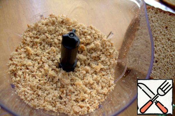 Grind into crumbs. You can add cumin, as the source advises.