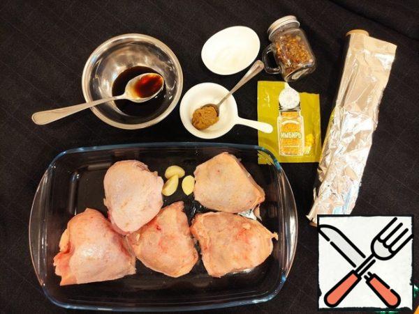 We will defrost the chicken thighs and prepare the necessary ingredients.