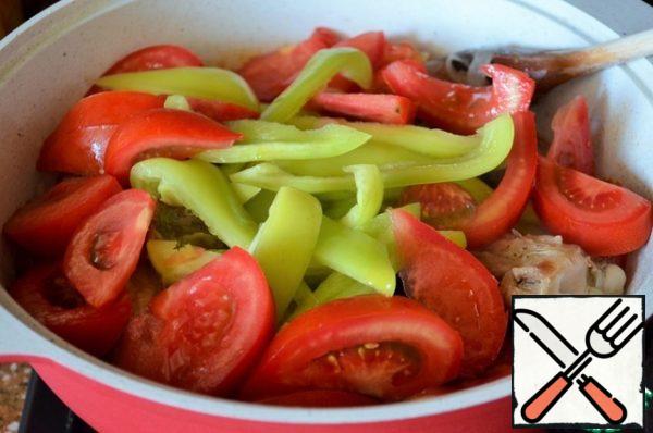 Add tomato slices and strips of bell pepper. Lightly fry, 2-3 minutes.