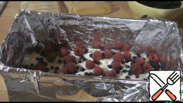 We put a small layer of cream on the bottom, berries on top.