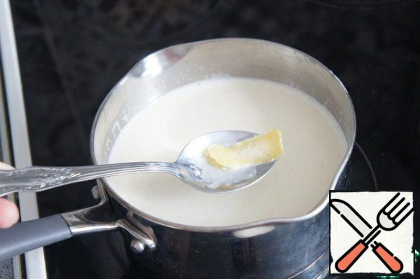 Remove the lemon zest.
Enter the gelatin.

If you are afraid of overheating the gelatin, there is an easy way to determine the temperature without a cooking thermometer. Dip a clean finger into the liquid, if it is difficult to tolerate, then the temperature is about 60-65 degrees and gelatin can be injected.